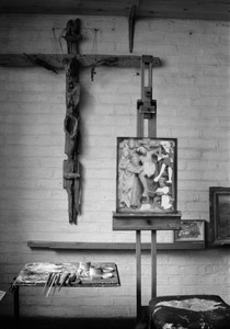A cross made from driftwood and 'Deposition, Study from an Alabaster Carving' in Richard's Studio. Photo by Crispin Eurich.