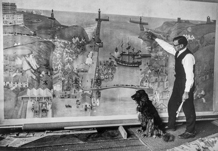 Richard and his dog, Star, with the Whitby mural.